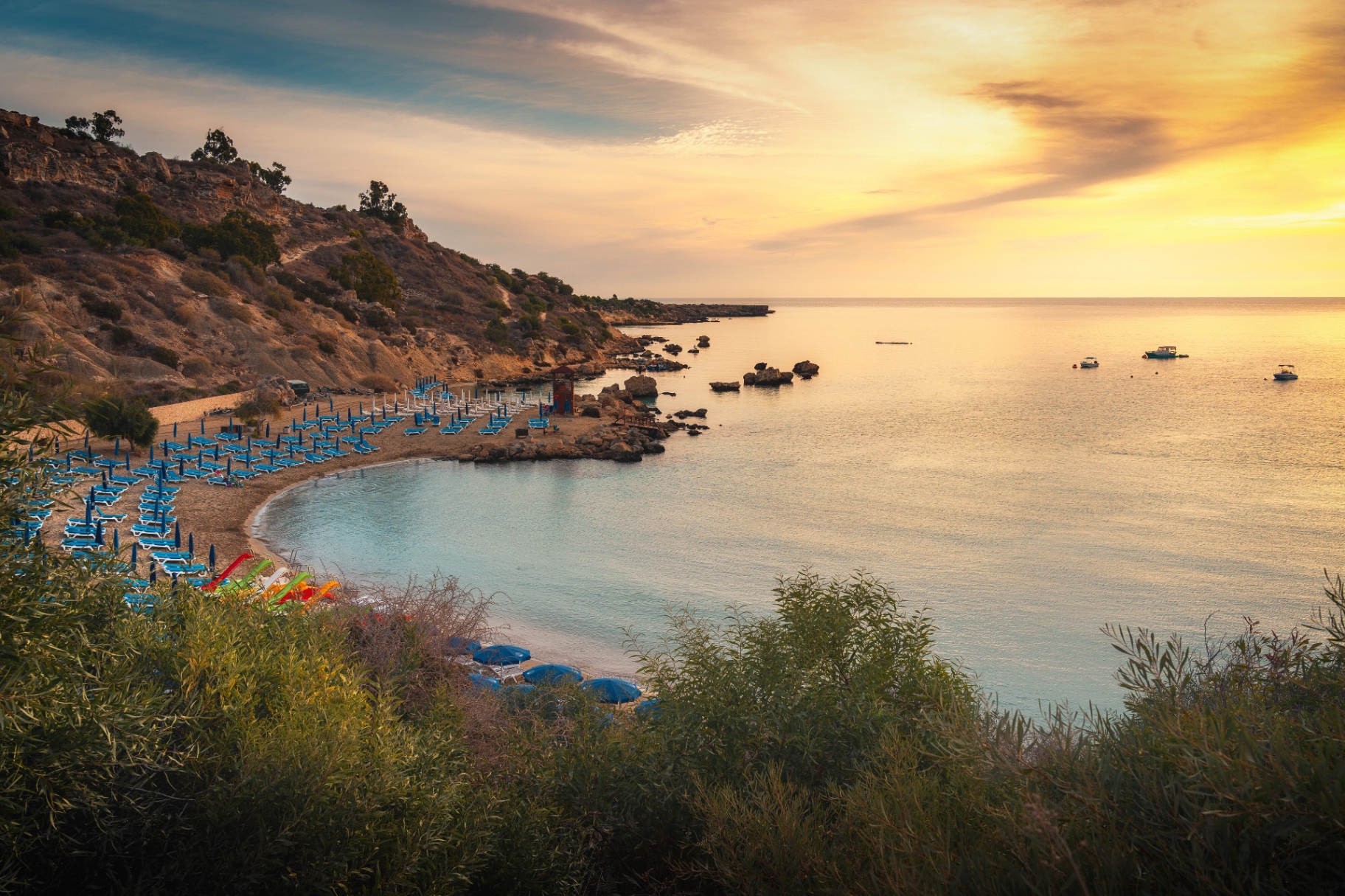 Sunlit Mediterranean coastline in Cyprus at golden hour